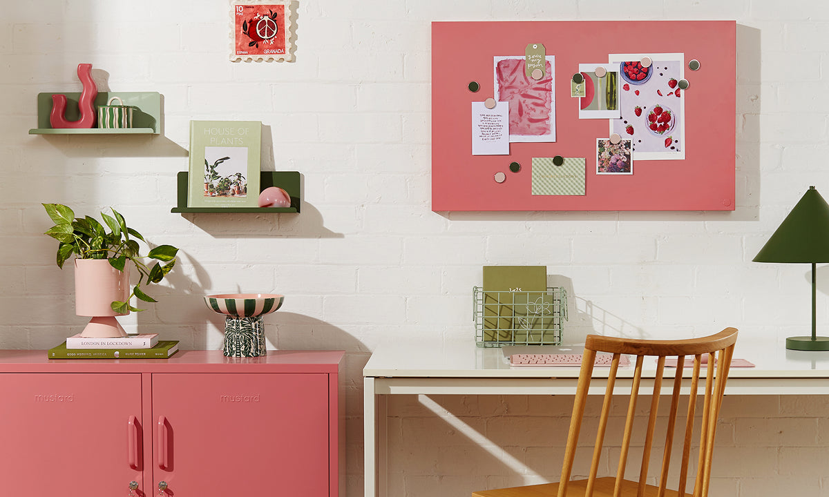 A styled study space with a Berry Lowdown locker, Sage and Olive Ledge shelves and a magnetic Storyboard above a wooden desk