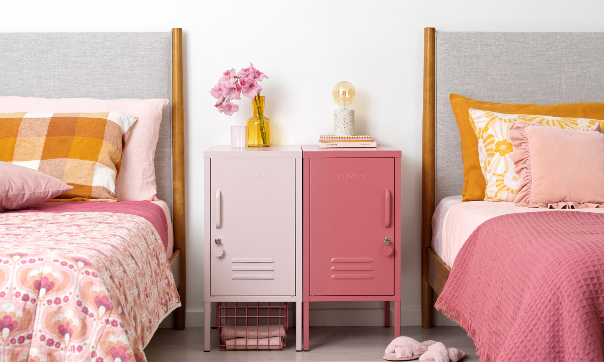 The Shorty in Blush and The Shorty to the Left in Berry side by side. There are beds with pink bedspreads on either side.
