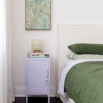 The Shorty in Lilac to the Left