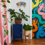 The Shorty in Navy to the Left